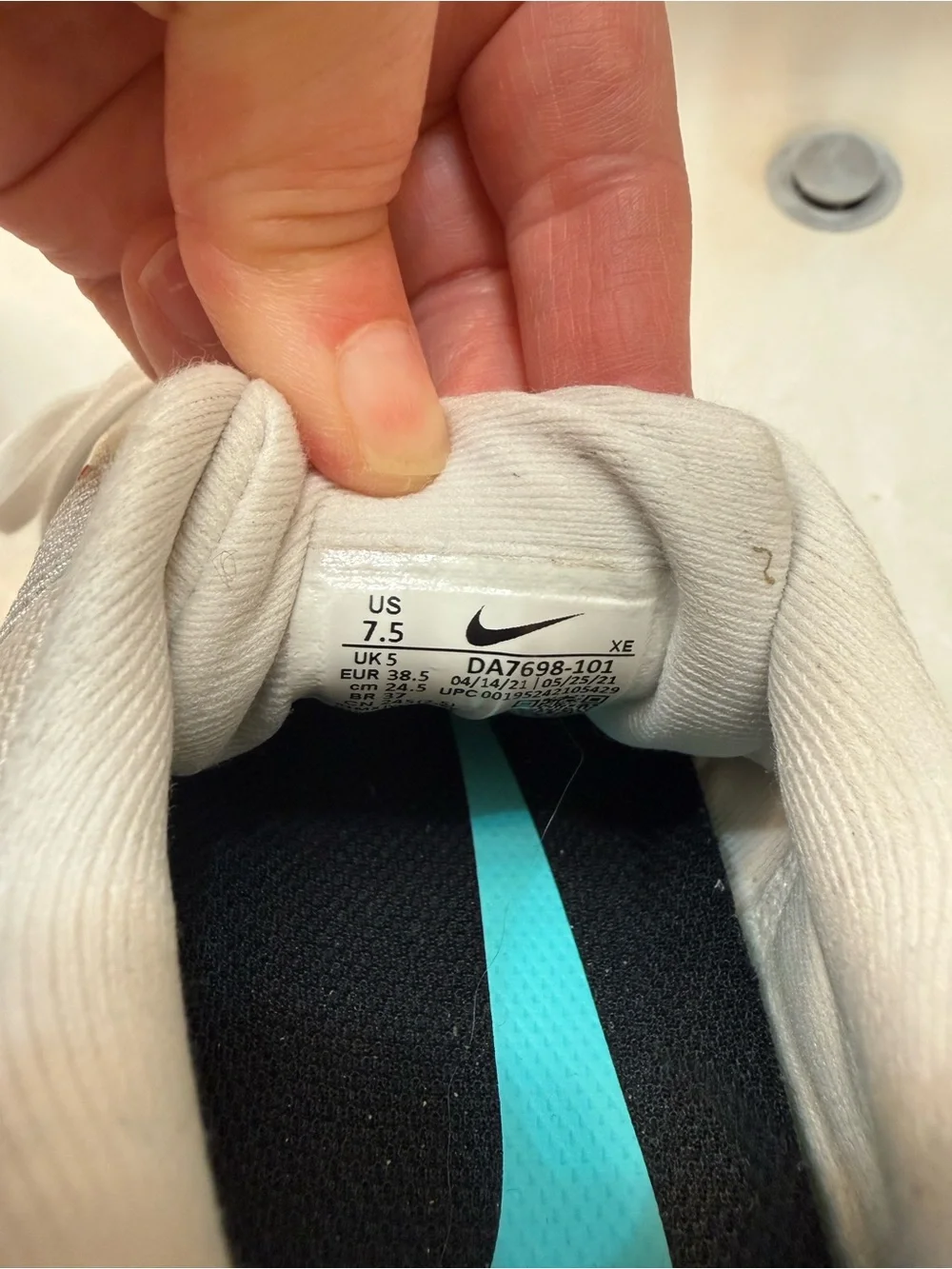 Nike Women’s White Running Shoes with Coral and Teal Accents
